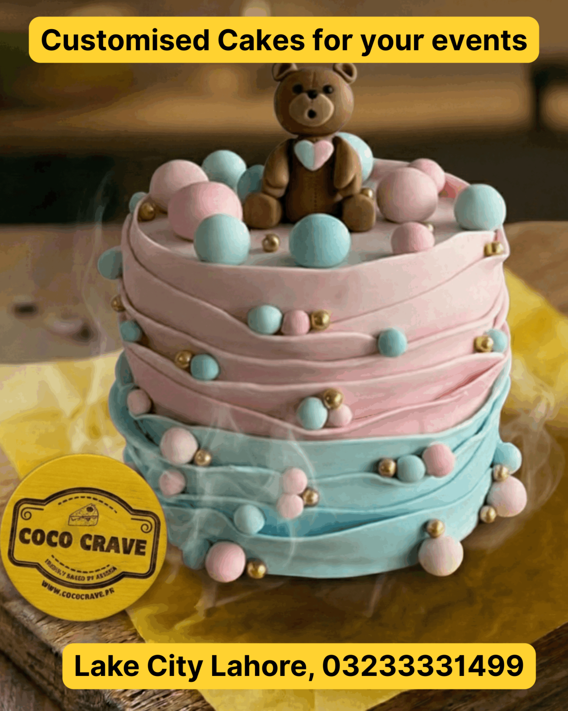 Blue tiered custom cake for baby boy cake delivery lahore with white clouds.