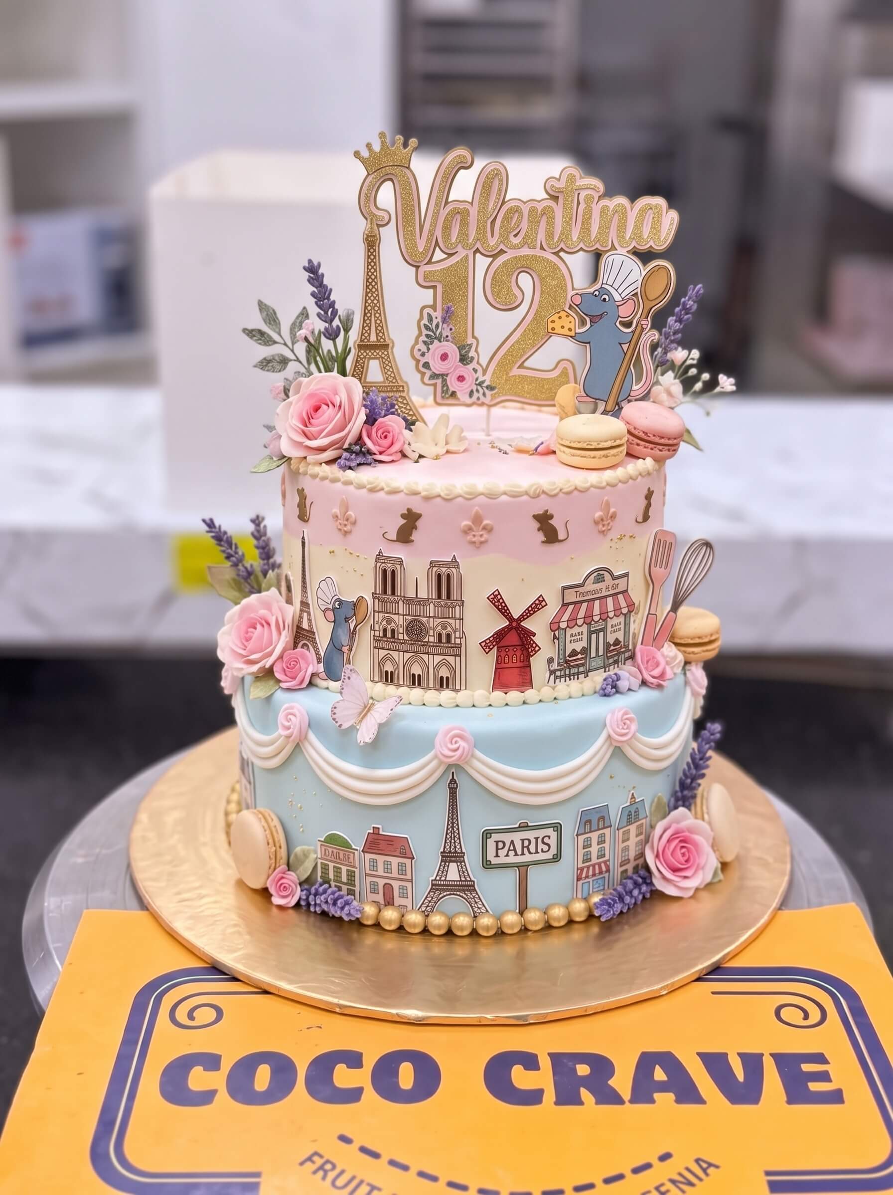 Paris Theme Two Tier Birthday Cake in Lahore — photo 2 by CocoCrave.pk Paris Theme Two Tier Birthday Cake in Lahore — photo 2