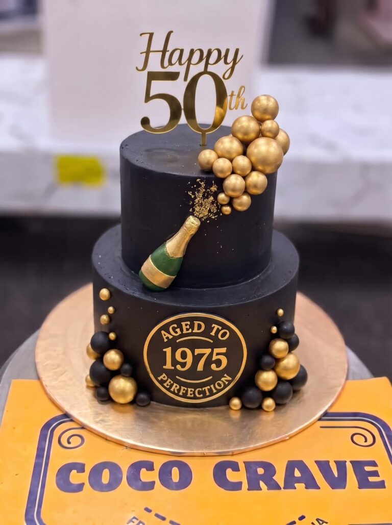 Black and Gold Champagne Birthday Cake in Lahore