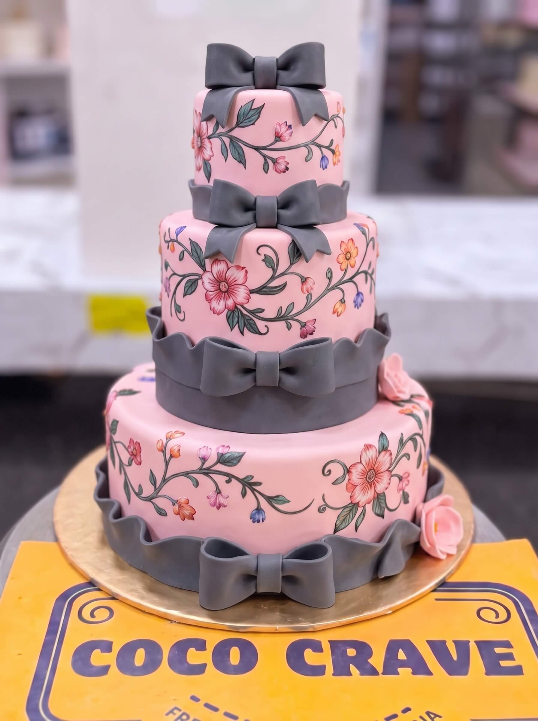Pink and Grey Bow Floral Cake in Lahore — photo 2 by CocoCrave.pk Pink and Grey Bow Floral Cake in Lahore — photo 2