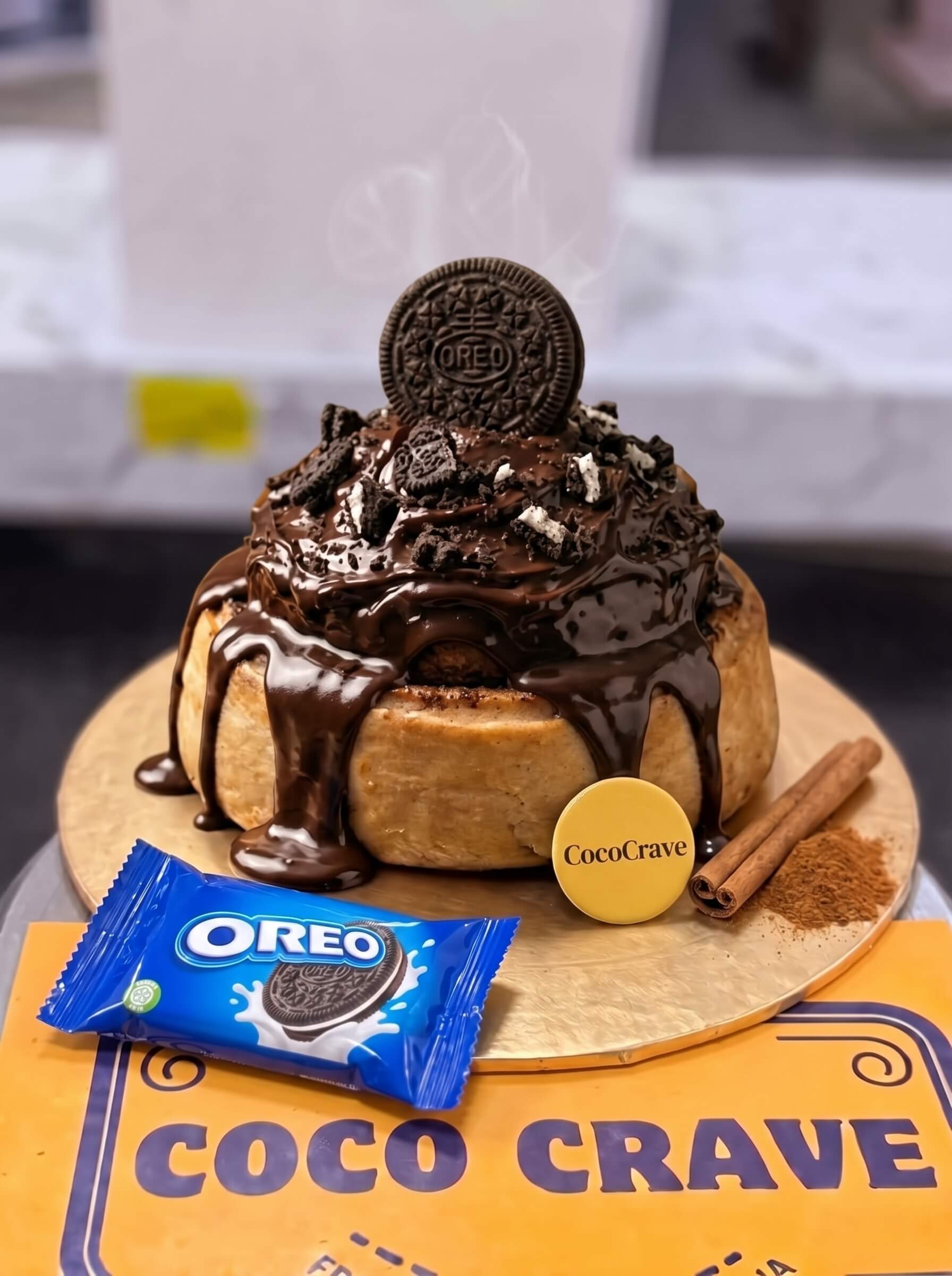 Chocolate and Oreo Loaded Cinnamon Roll in Lahore | CocoCrave.pk Chocolate and Oreo Loaded Cinnamon Roll in Lahore by CocoCrave.pk