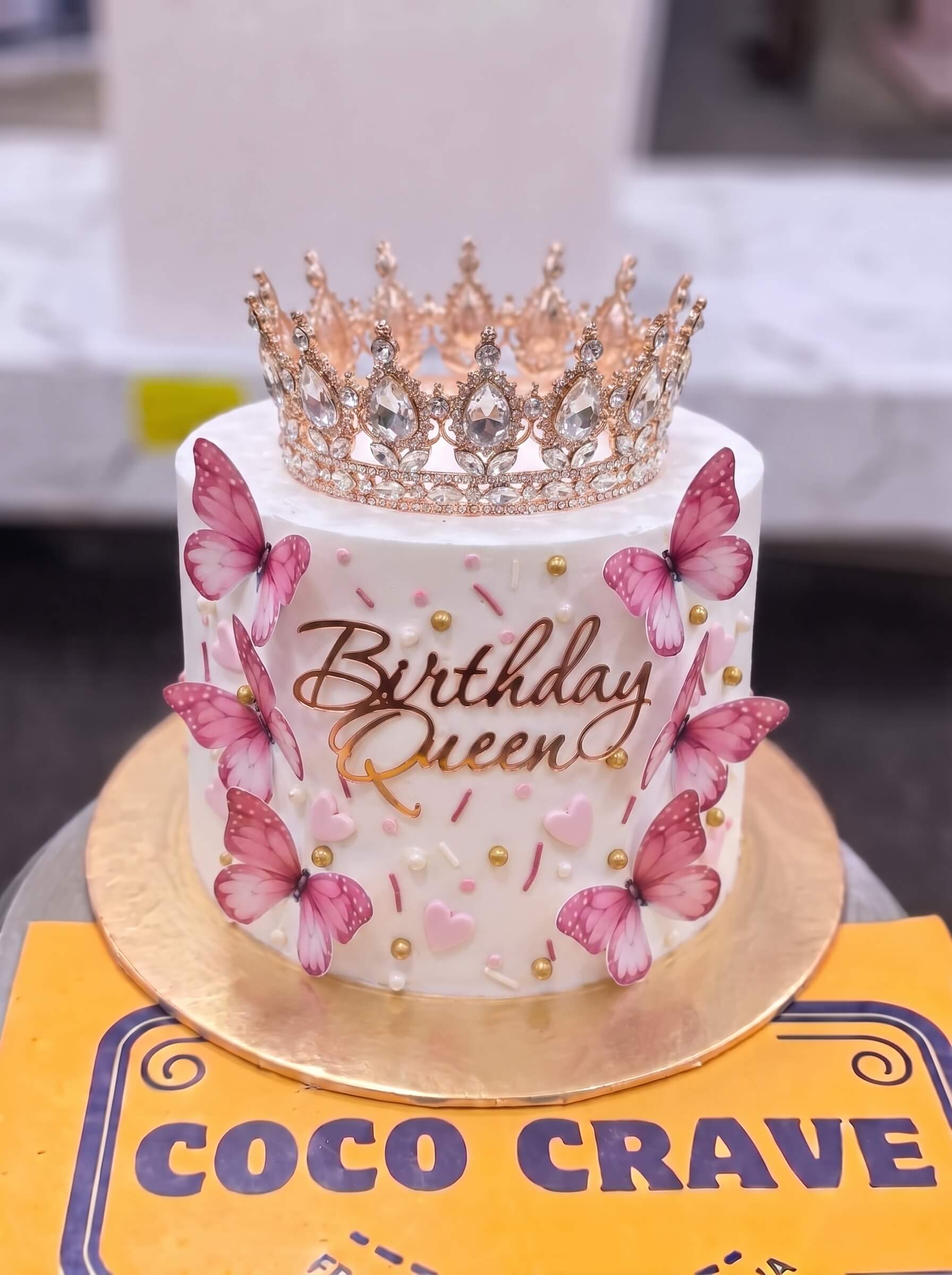 Edit_cake_image_and_move_2K_202609060423 Pink Butterfly Birthday Queen Crown Cake in Lahore — Cococrave Lahore