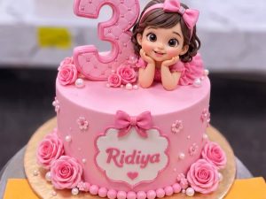 Barbie Girl 3rd Birthday Cake in Lahore — A soft pink birthday cake for a little girl — a sweet doll figurine resting on top beside a glitter age number