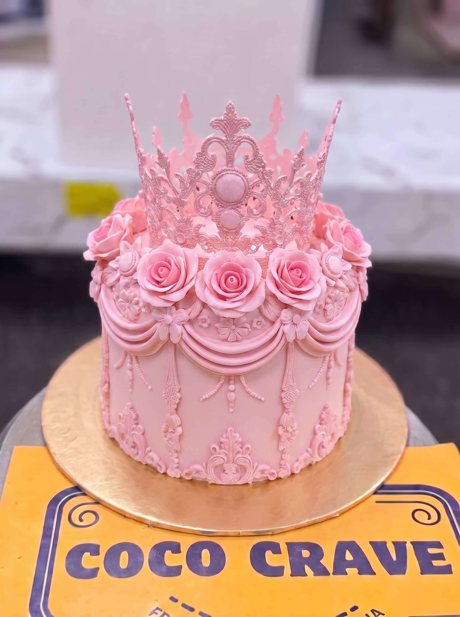 Edit_cake_image_placement_2K_202609060422 (1) Pink Rose Tiara Crown Cake in Lahore — Cococrave Lahore