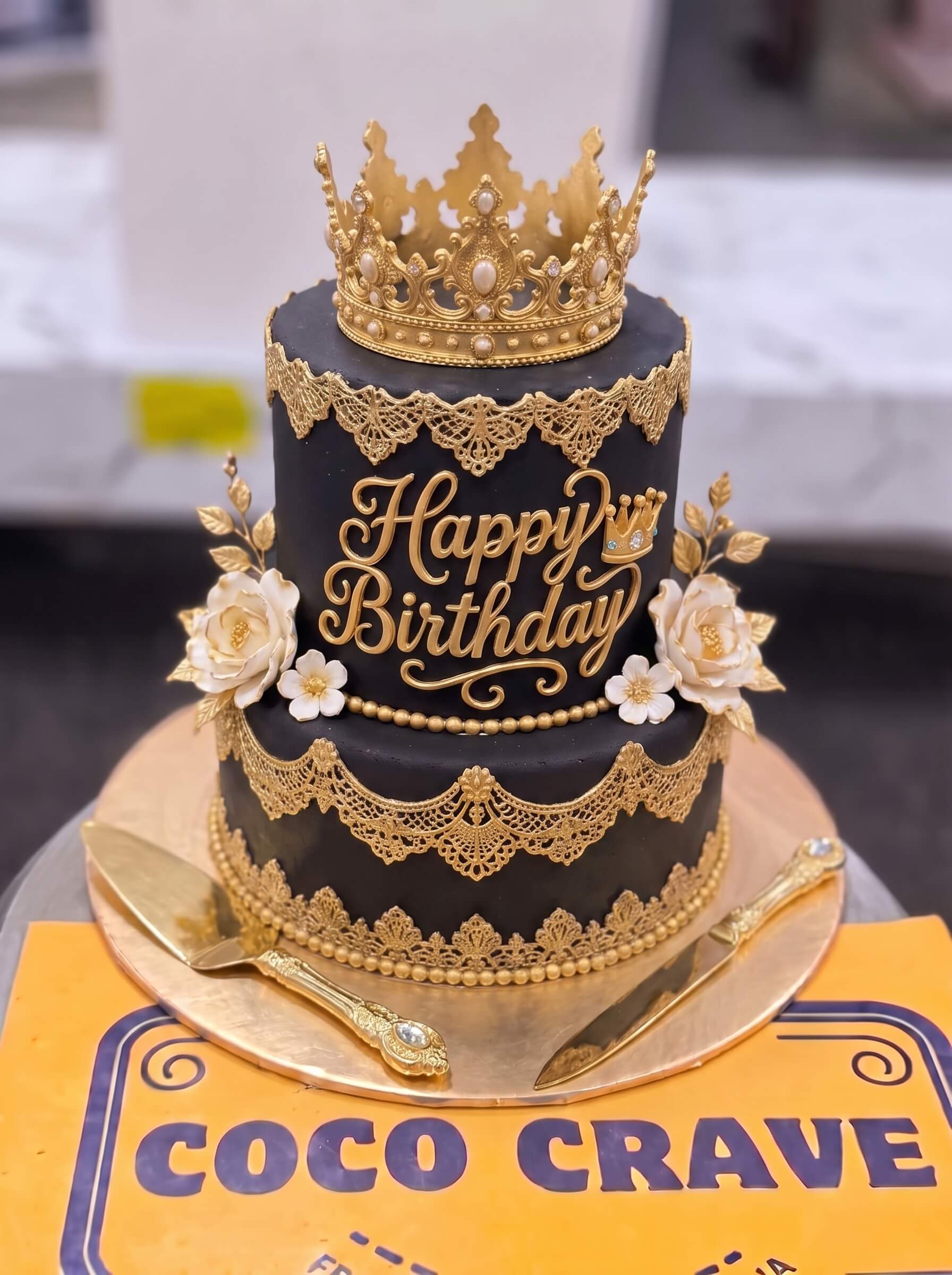 Edit_cake_image_placement_2K_202609060422 (4) Black And Gold Lace Crown Cake in Lahore — Cococrave Lahore