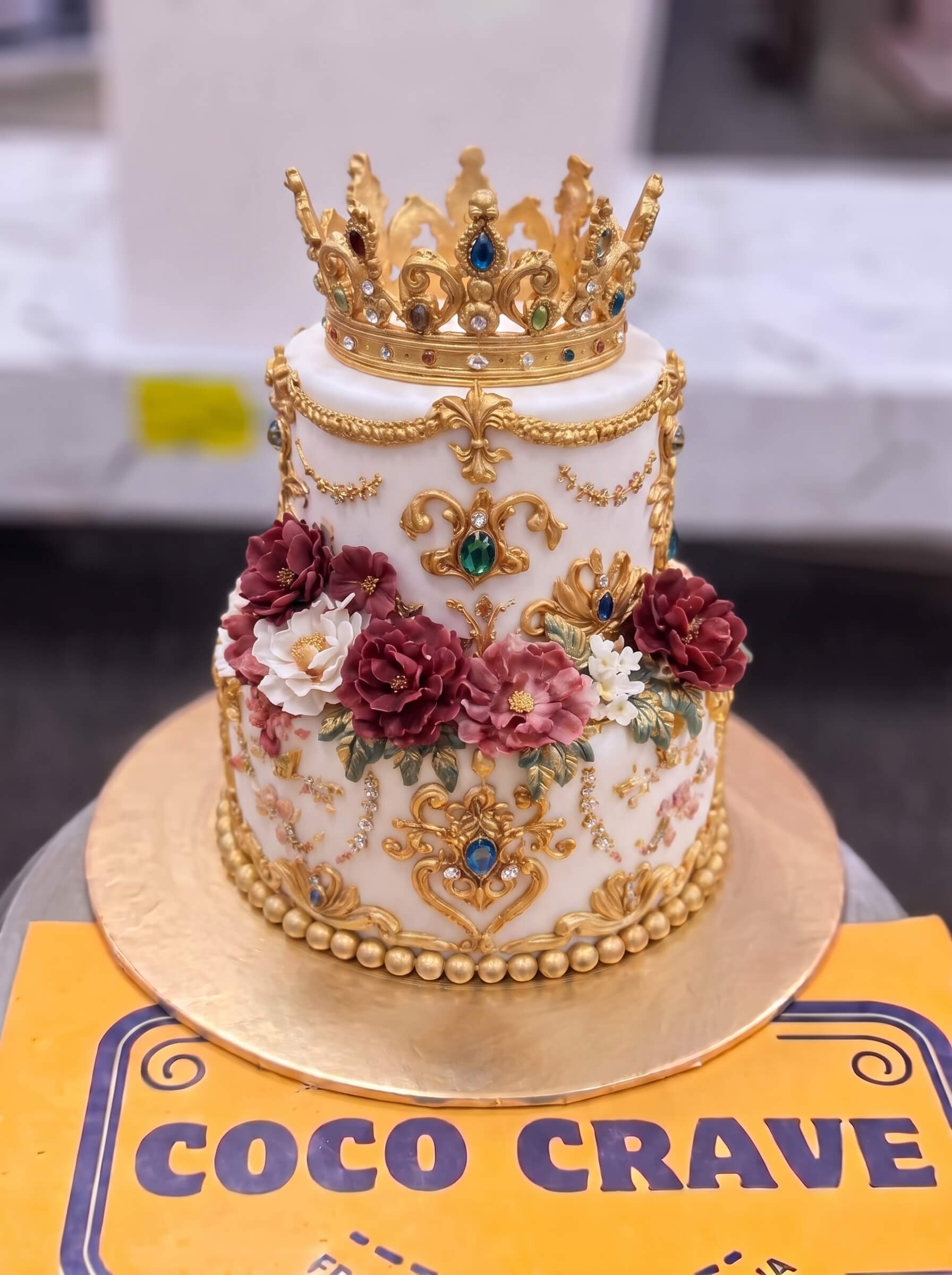 Edit_cake_image_placement_2K_202609060422 Baroque Floral Crown Cake in Lahore — Cococrave Lahore