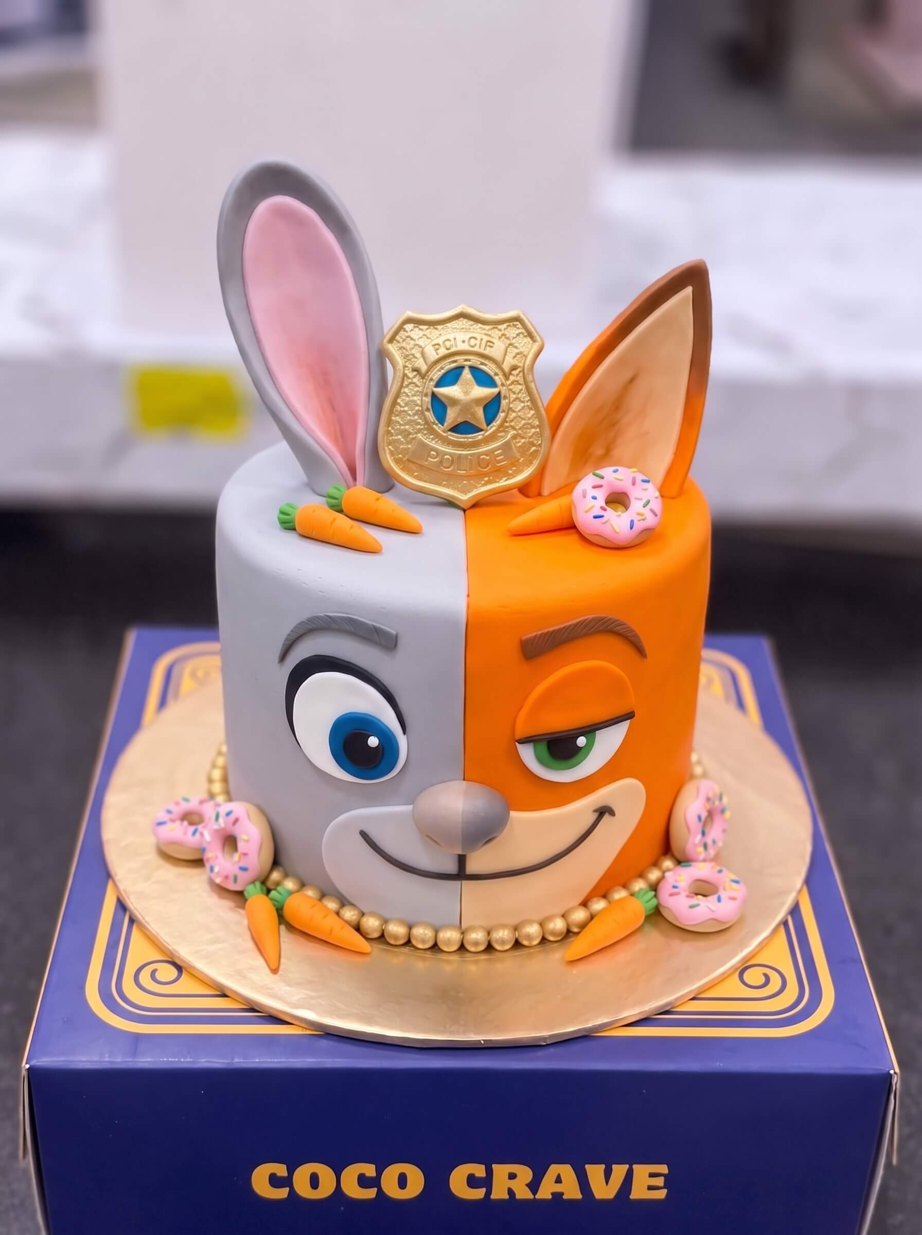 Zootopia Cake in Lahore — CocoCrave.pk Zootopia Cake in Lahore by CocoCrave.pk — single tier Zootopia cake in grey and orange