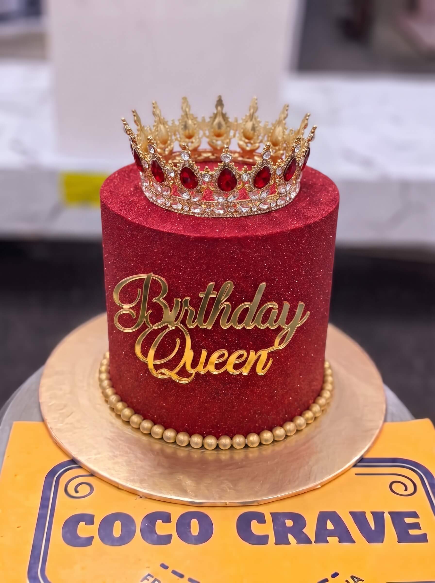 Edit_cake_images_2K_202609060418 Maroon Velvet Birthday Queen Crown Cake in Lahore — Cococrave Lahore