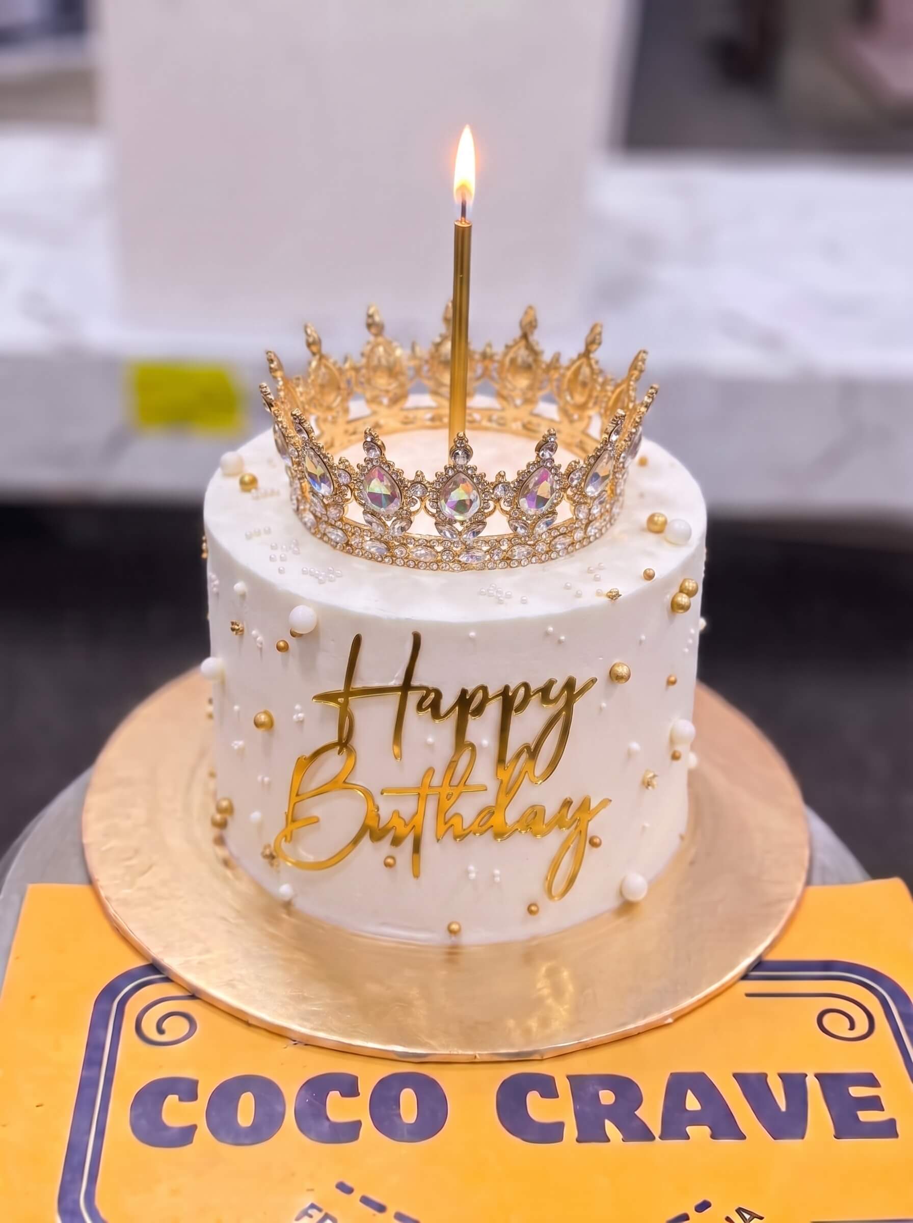 Edit_cake_placement_in_image_2K_202609060425 Pearl Candle Crown Cake in Lahore — Cococrave Lahore