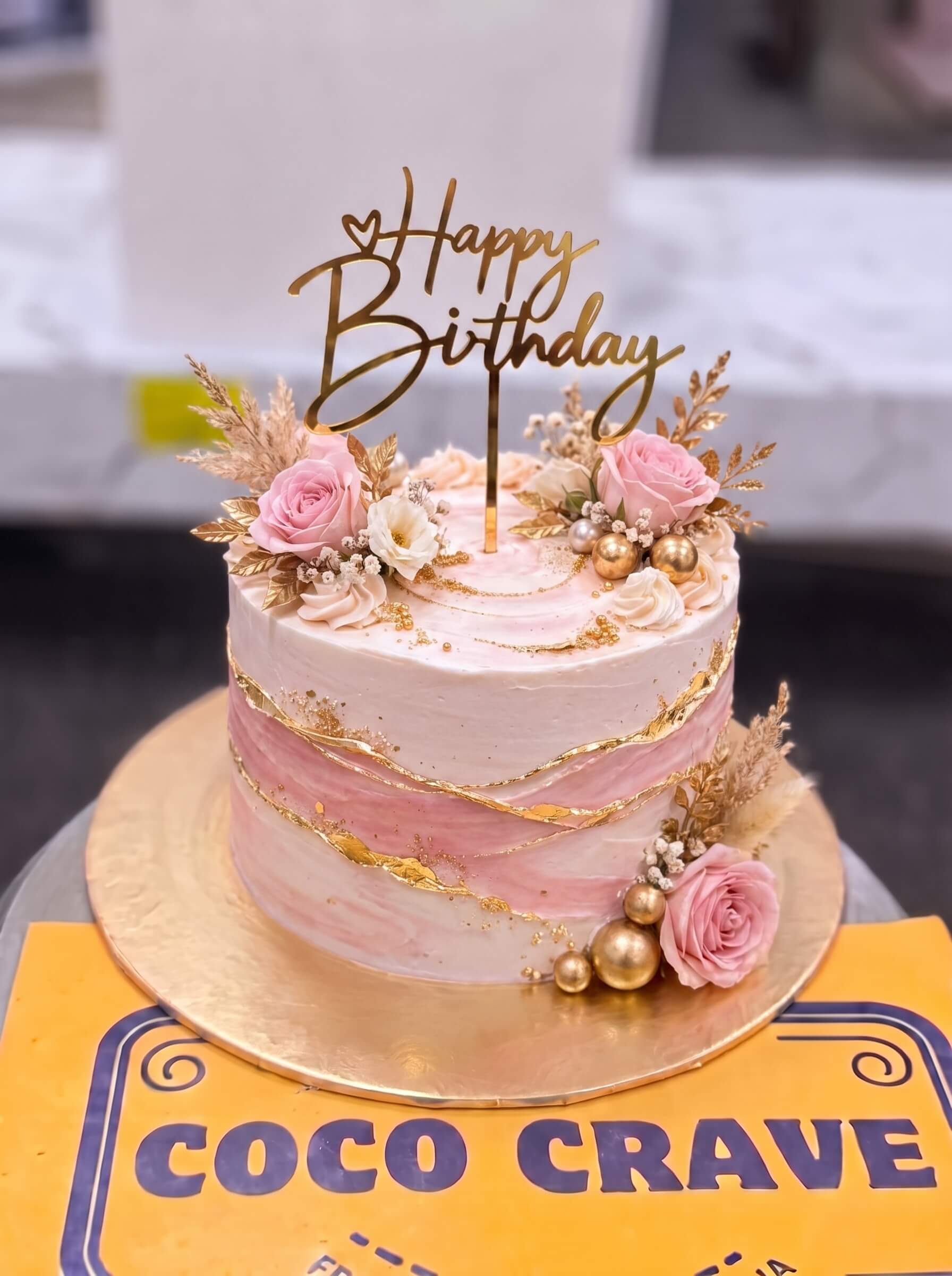 Edit_cake_placement_in_images_2K_202609060418 Blush Rose Gold Crown Cake in Lahore — Cococrave Lahore