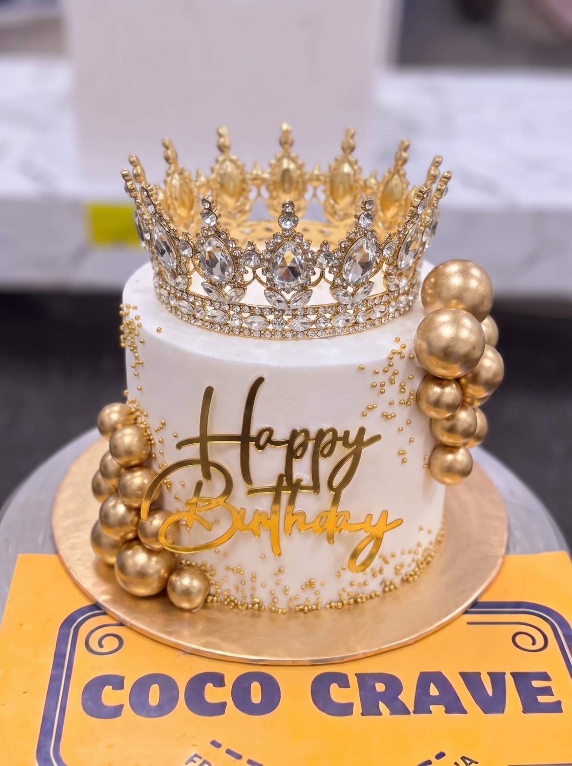 Gold Balloon Crown Cake in Lahore — Cococrave Lahore