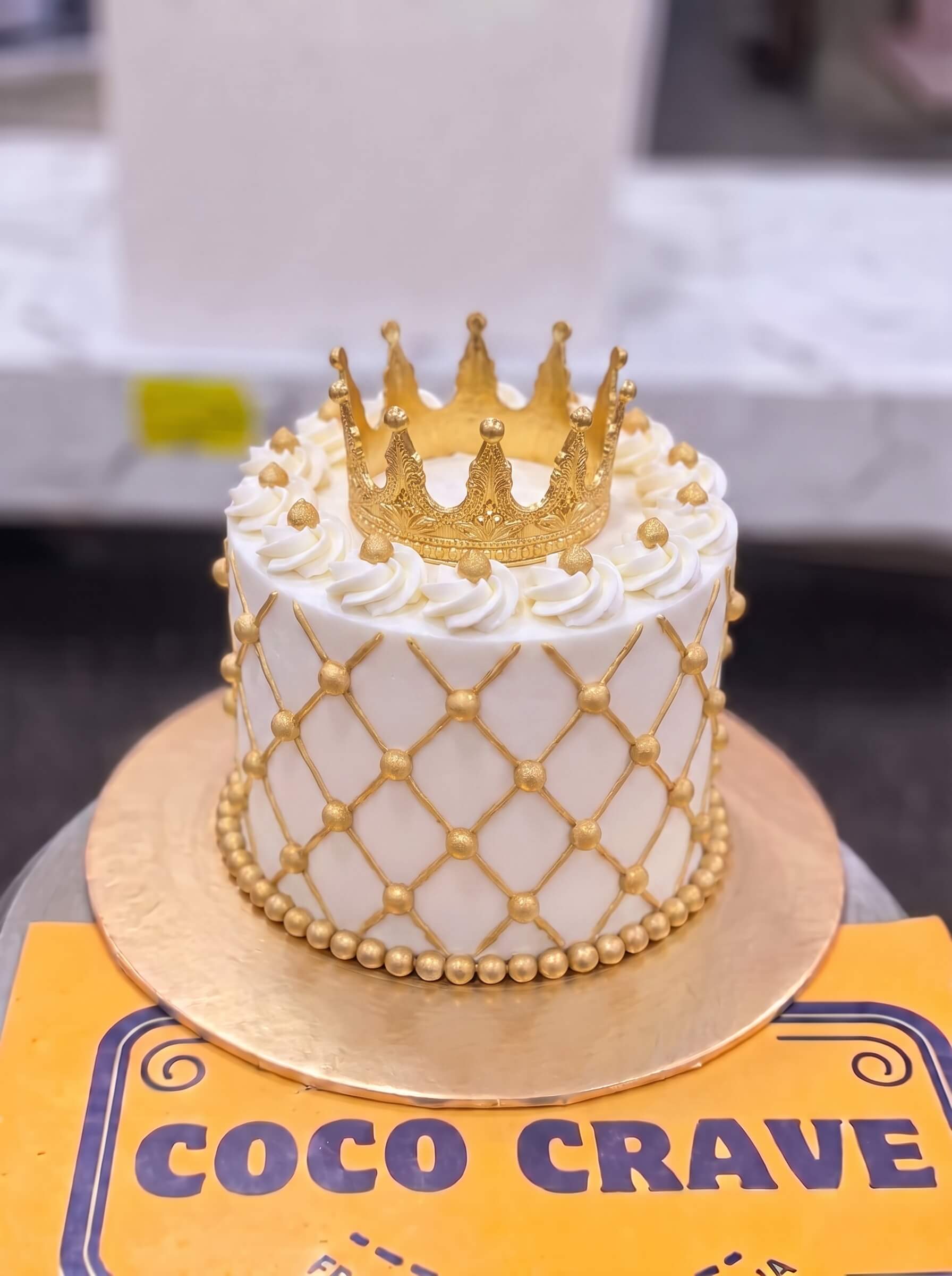 Edit_crown_cake_into_image_2K_202609060426 Gold Lattice Crown Cake in Lahore — Cococrave Lahore