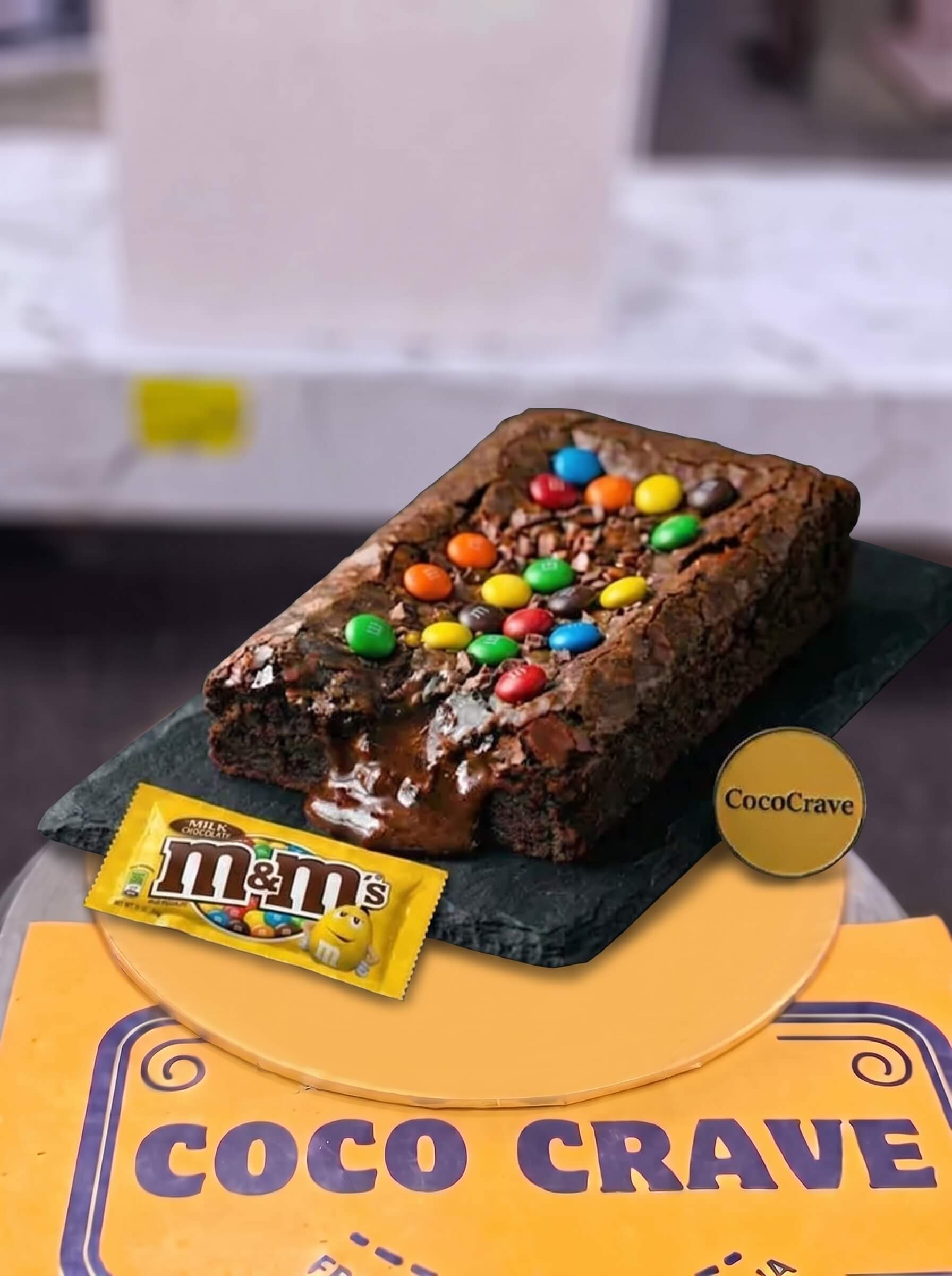 M&Ms Loaded Fudge Brownie in Lahore | CocoCrave.pk M&Ms Loaded Fudge Brownie in Lahore by CocoCrave.pk