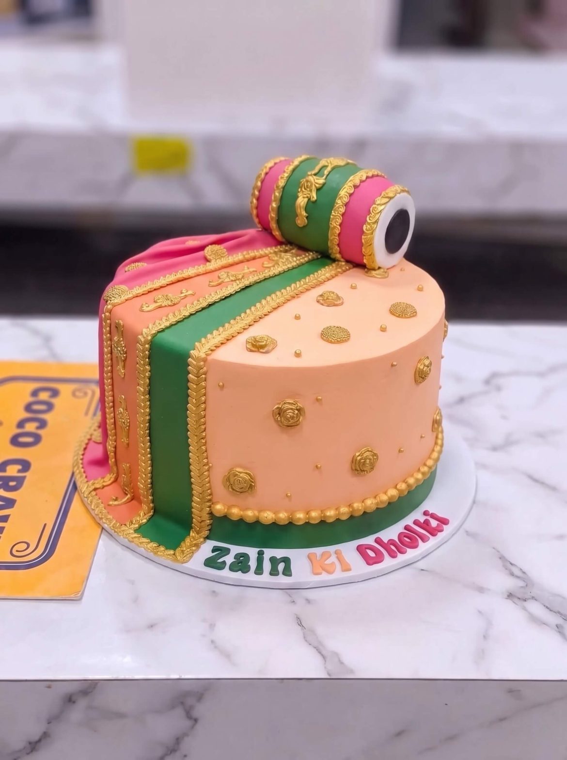 Peach & Green Dholki Mayoun Cake in Lahore
