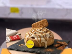 Vanilla Lotus Biscoff Cream Cheese Cinnamon Roll in Lahore by CocoCrave.pk