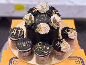 Black Gold Celebration Cake with Cupcakes in Lahore