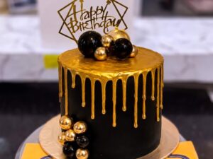 Black Gold Drip Birthday Cake in Lahore