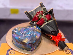 Blue Galaxy Cake and Red Rose Bouquet in Lahore
