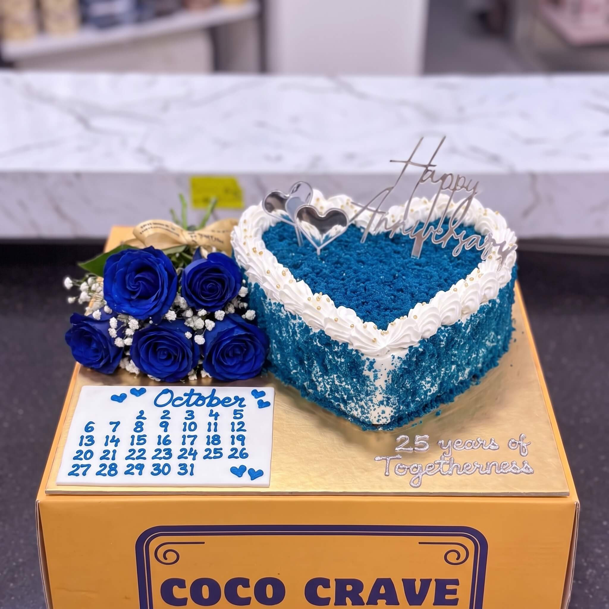 Blue Heart Anniversary Cake with White Roses in Lahore Blue Heart Anniversary Cake with White Roses in Lahore — CocoCrave Lahore