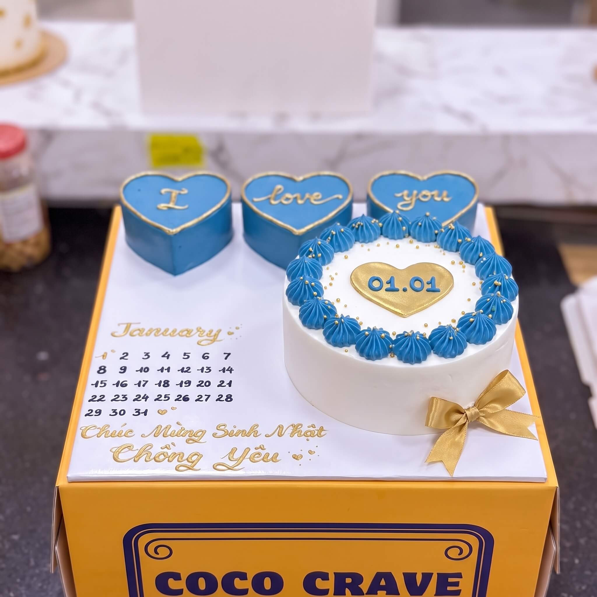 Blue Heart Calendar Anniversary Cake in Lahore Blue Heart Calendar Anniversary Cake in Lahore — CocoCrave Lahore