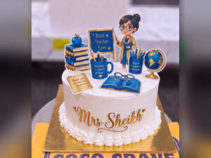 Blue Teacher Birthday Cake with Books in Lahore — CocoCrave Lahore
