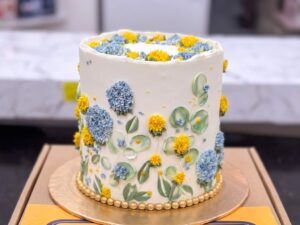 Blue Yellow Floral Print Birthday Cake in Lahore
