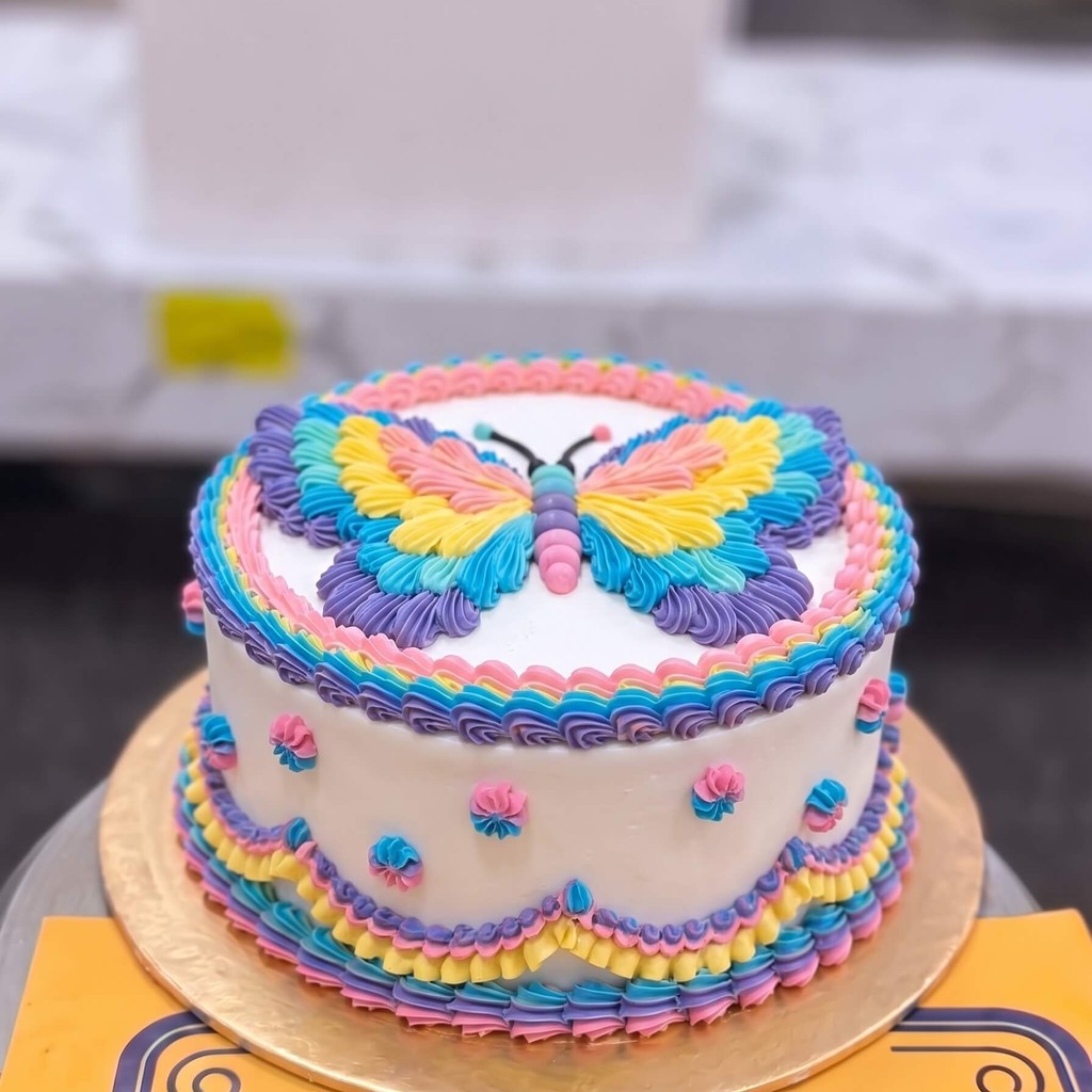 Butterfly Piped Birthday Cake in Lahore — CocoCrave.pk Butterfly Piped Birthday Cake in Lahore by CocoCrave.pk — single tier butterfly cake