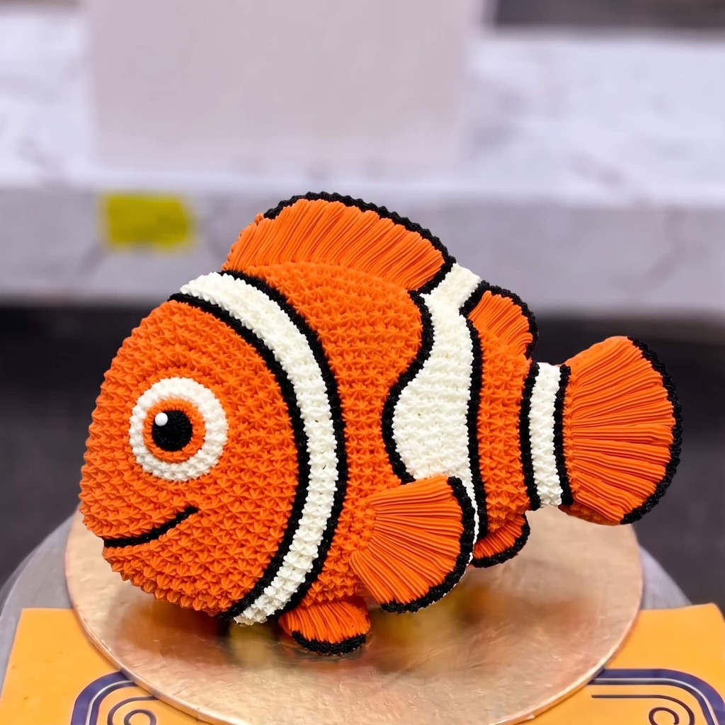 Clownfish Shaped Birthday Cake in Lahore — CocoCrave.pk Fish Theme Cakes by CocoCrave.pk — premium fish theme cakes delivered in Lahore