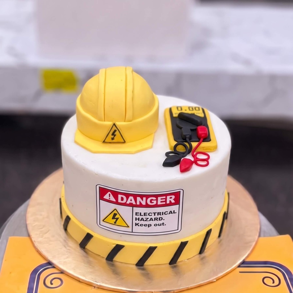 Electrician Cake with Hard Hat and Tools in Lahore Electrician Cake with Hard Hat and Tools by CocoCrave.pk in Lahore