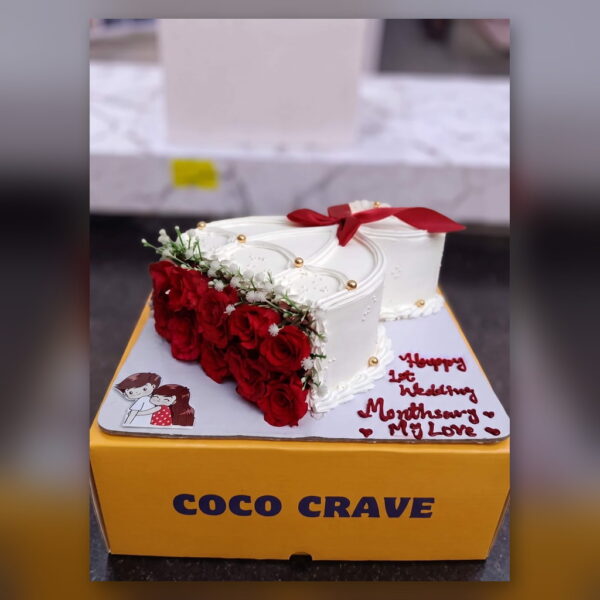 First Wedding Anniversary Heart Cake in Lahore — delivered in Eme Society, Lahore