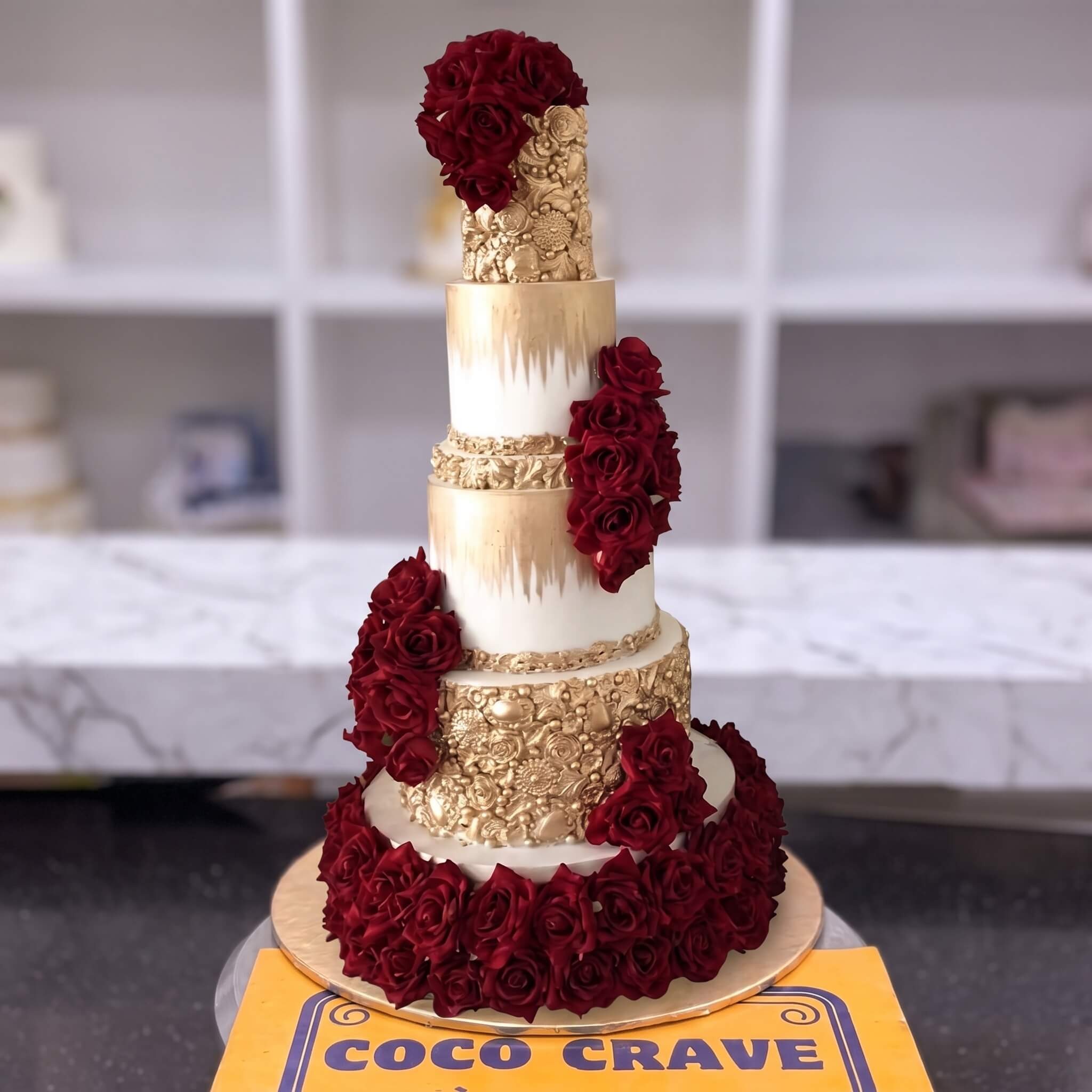 Gold and Red Rose Grand Tiered Walima Cake in Lahore Gold and Red Rose Grand Tiered Walima Cake in Lahore — CocoCrave Lahore