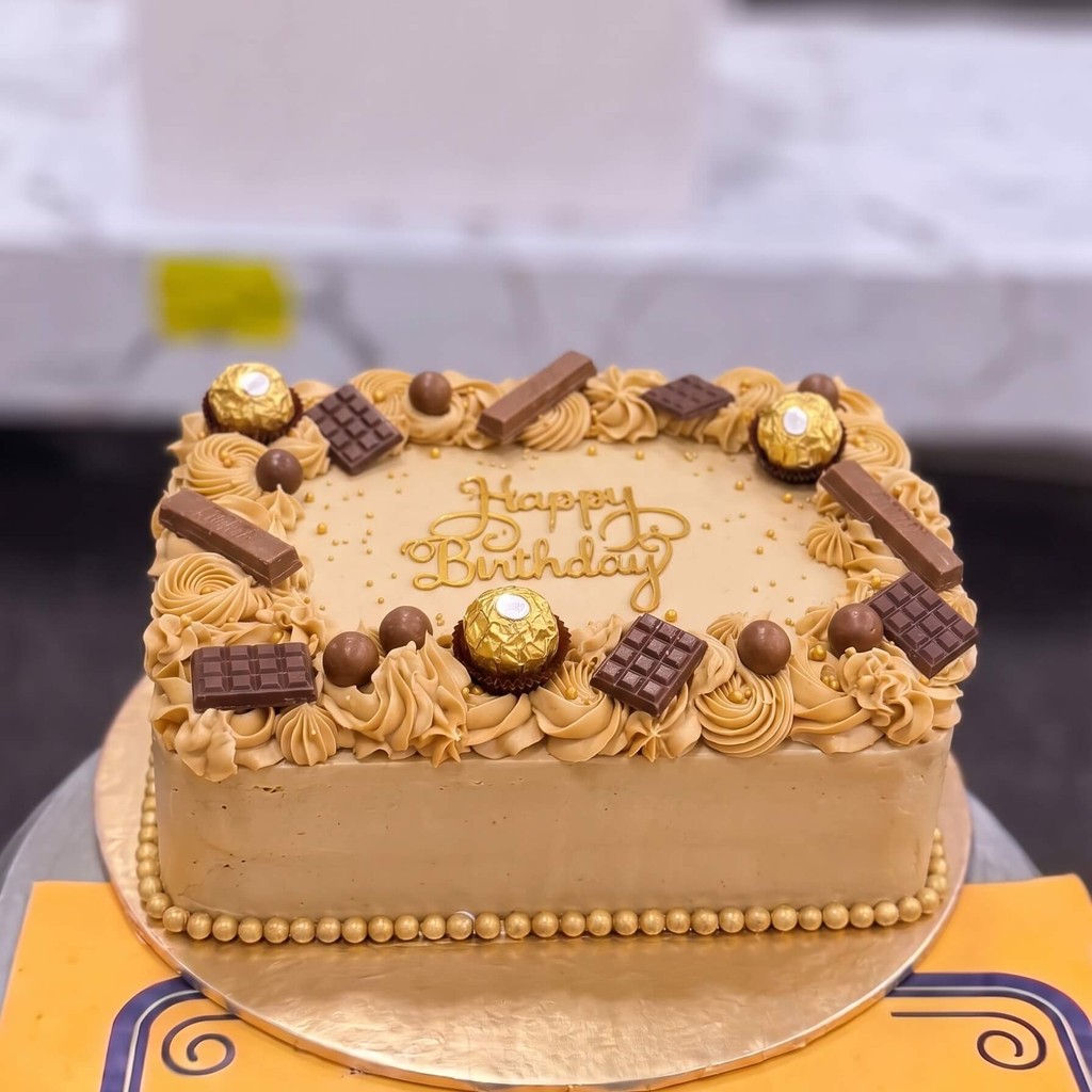 Golden Chocolate Bar Cake in Lahore Golden Chocolate Bar Cake by CocoCrave.pk in Lahore