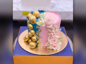 Half Blue Half Pink Cake with Gold Spheres in Lahore