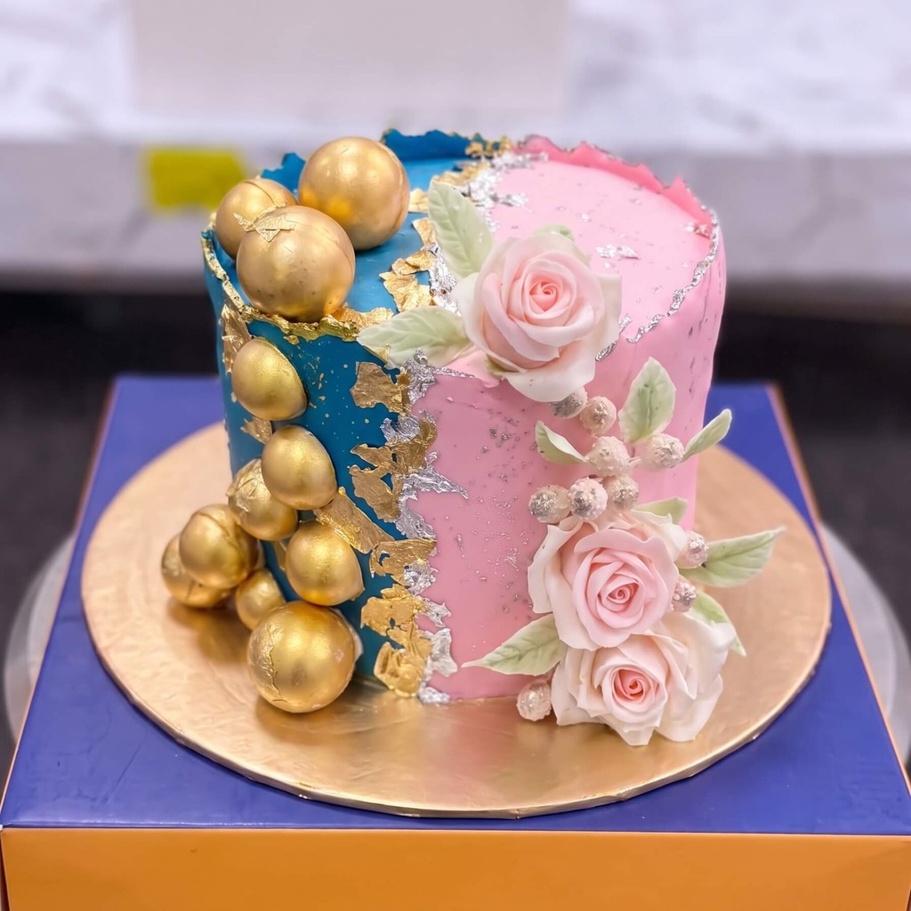 Half Blue Half Pink Cake with Gold Spheres in Lahore Half Blue Half Pink Cake with Gold Spheres by CocoCrave.pk in Lahore