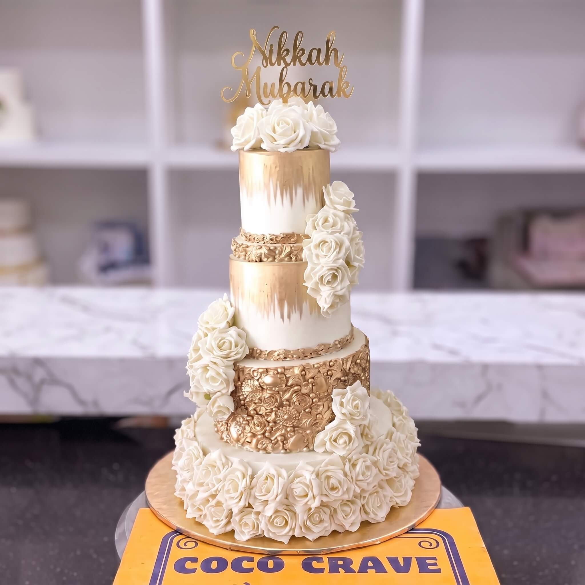 Ivory and Gold Baroque Four Tier Nikkah Cake in Lahore Ivory and Gold Baroque Four Tier Nikkah Cake in Lahore — CocoCrave Lahore