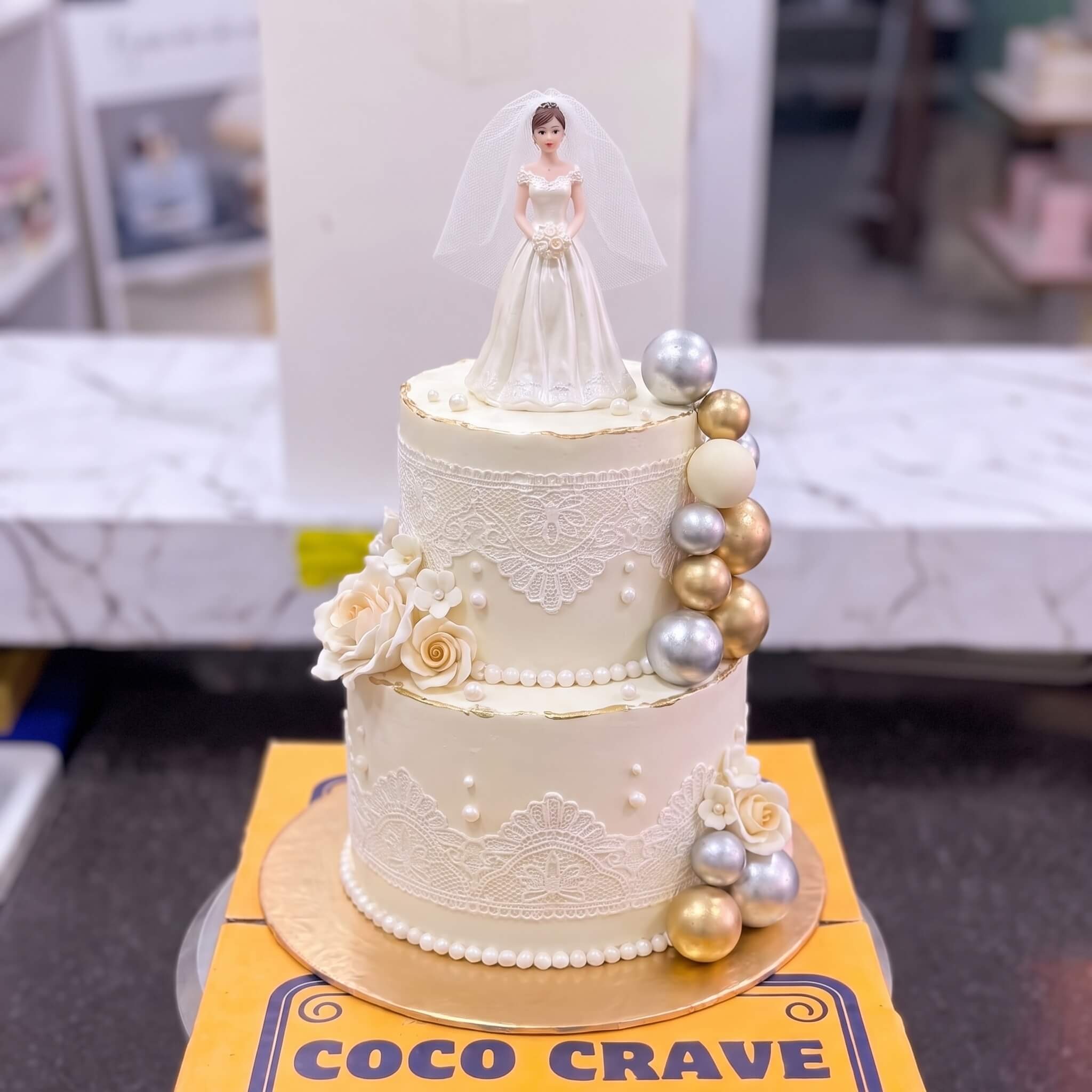 Ivory Bride Figurine Gold Pearl Cake in Lahore Ivory Bride Figurine Gold Pearl Cake in Lahore — CocoCrave Lahore