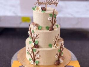 Ivory Green Floral Three Tier Anniversary Cake in Lahore