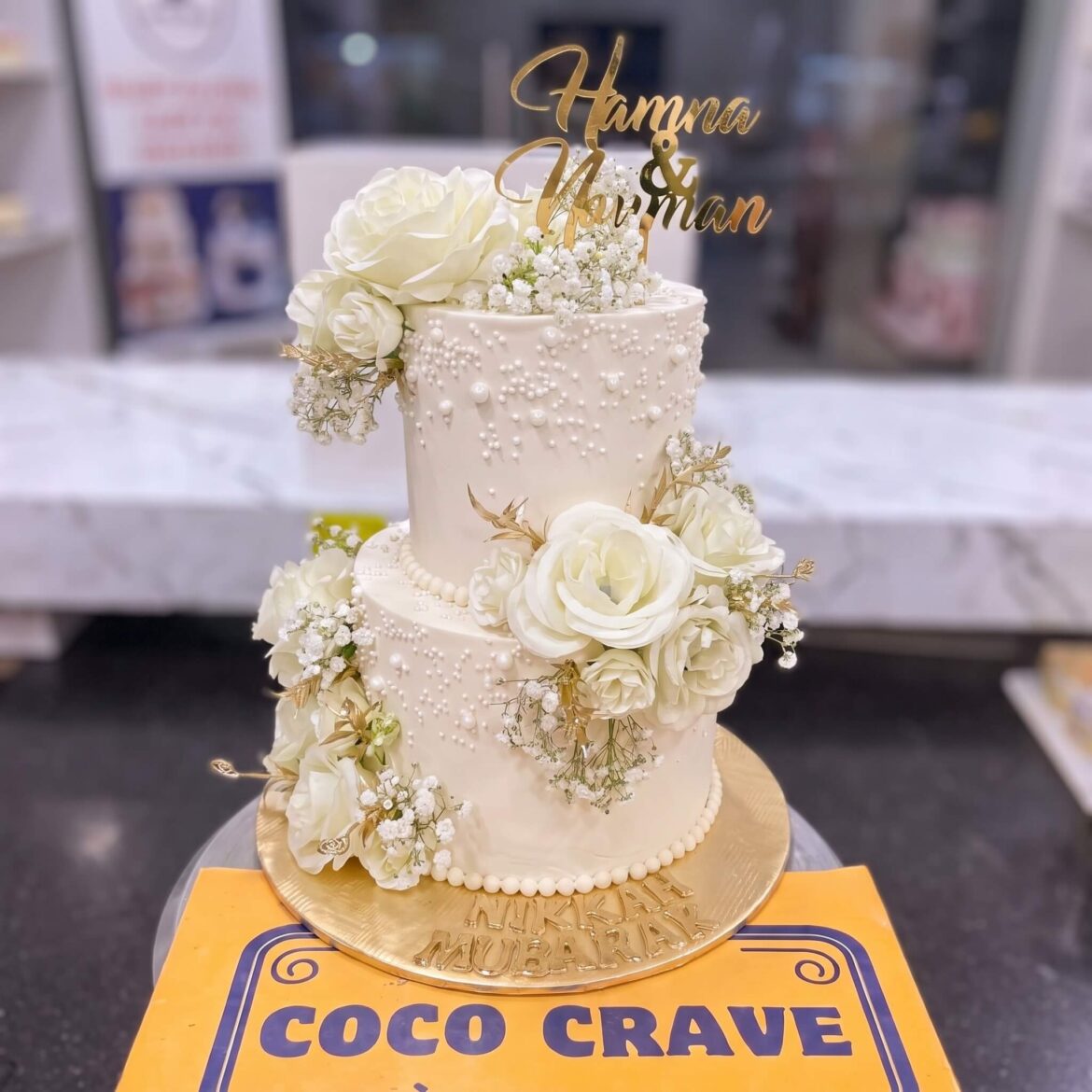 Ivory Pearl and Gold Leaf Two Tier Nikkah Cake in Lahore — CocoCrave Lahore