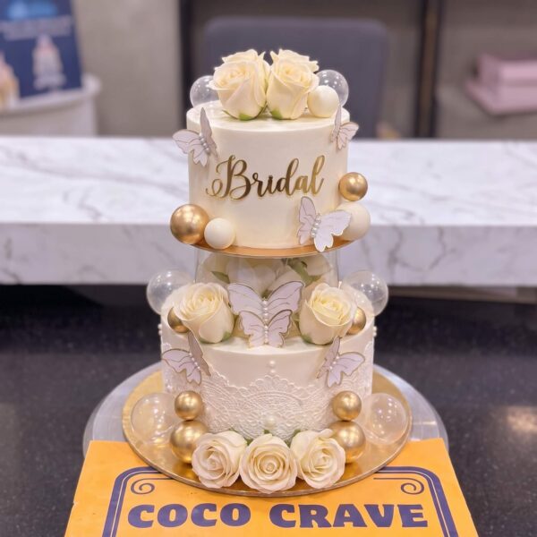 Ivory Pearl Two Tier Bridal Cake in Lahore — delivered in Lahore