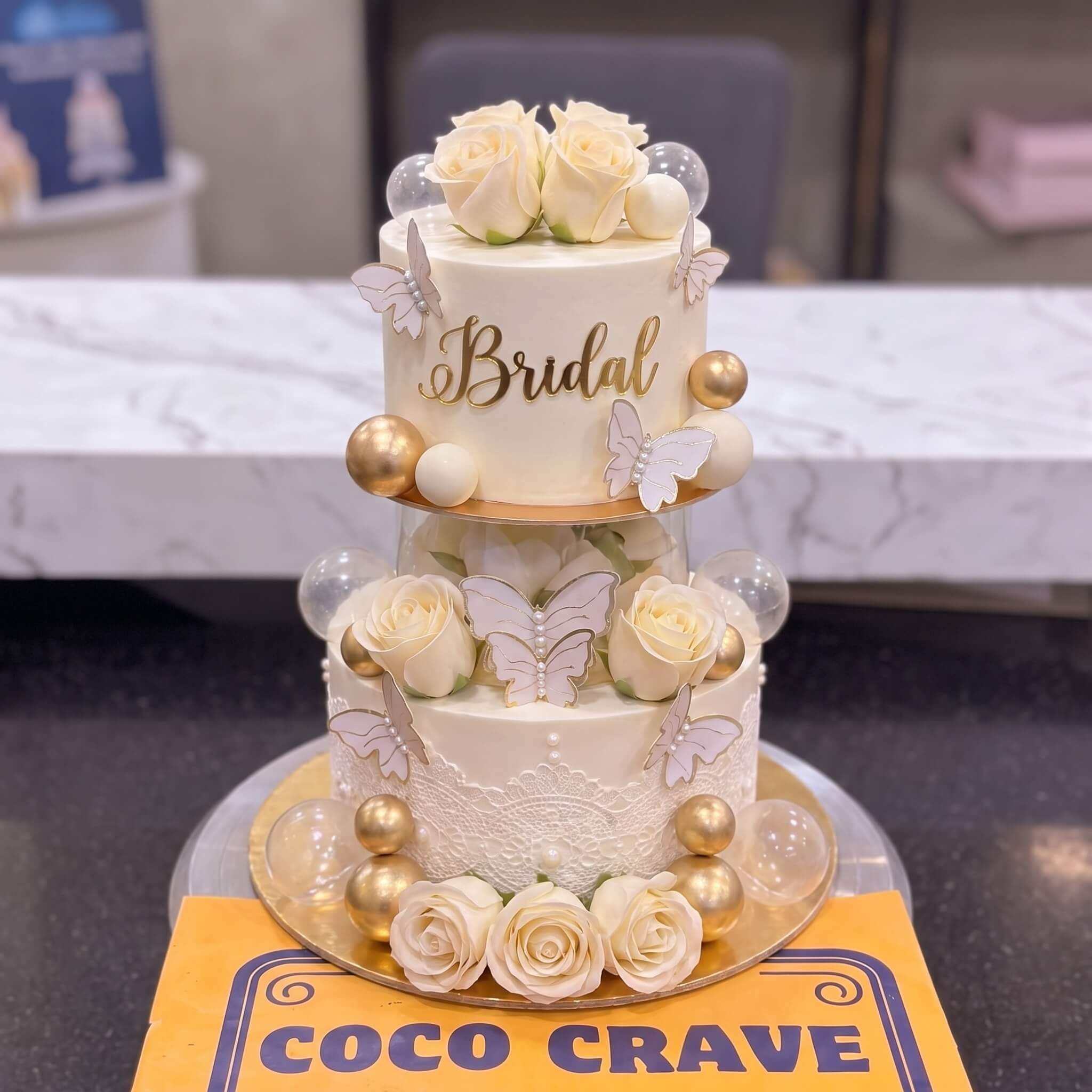 Ivory Pearl Two Tier Bridal Cake in Lahore Ivory Pearl Two Tier Bridal Cake in Lahore — CocoCrave Lahore