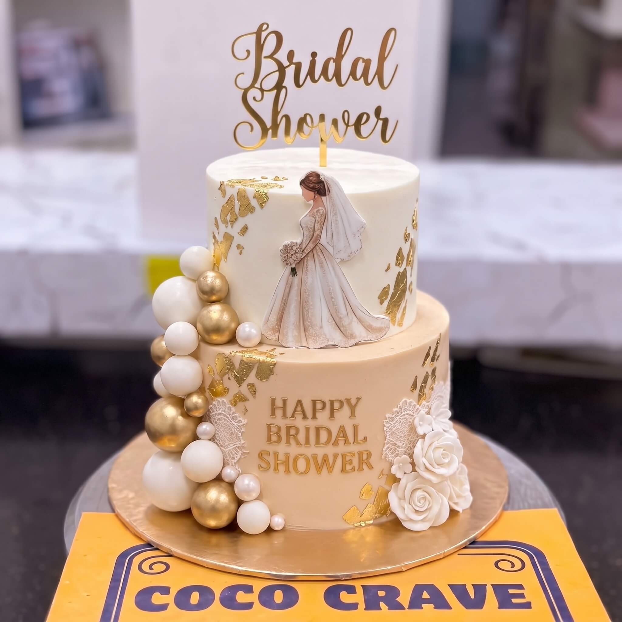 Ivory Two Tier Bride and Groom Cake in Lahore Ivory Two Tier Bride and Groom Cake in Lahore — CocoCrave Lahore