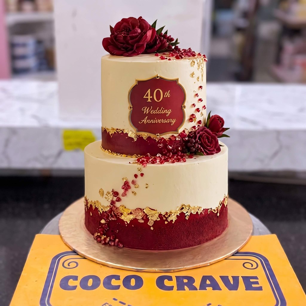 Ivory Two Tier Ruby Anniversary Cake in Lahore Ivory Two Tier Ruby Anniversary Cake in Lahore — CocoCrave Lahore