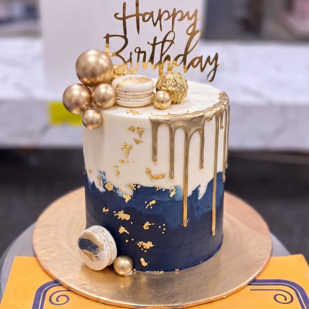 Navy and Gold Drip Cake in Lahore Navy and Gold Drip Cake — CocoCrave.pk Lahore