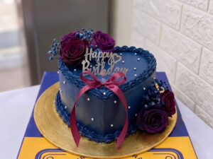 Navy Blue Floral Birthday Cake with Roses in Lahore — CocoCrave Lahore