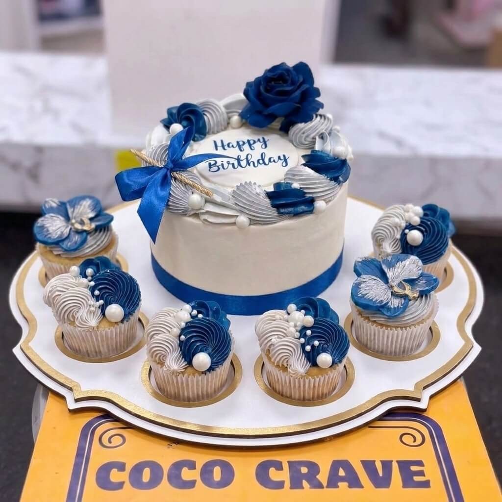 Navy Blue Rose Cake with Blue Cupcakes Set in Lahore Navy Blue Rose Cake with Blue Cupcakes Set in Lahore — CocoCrave Lahore