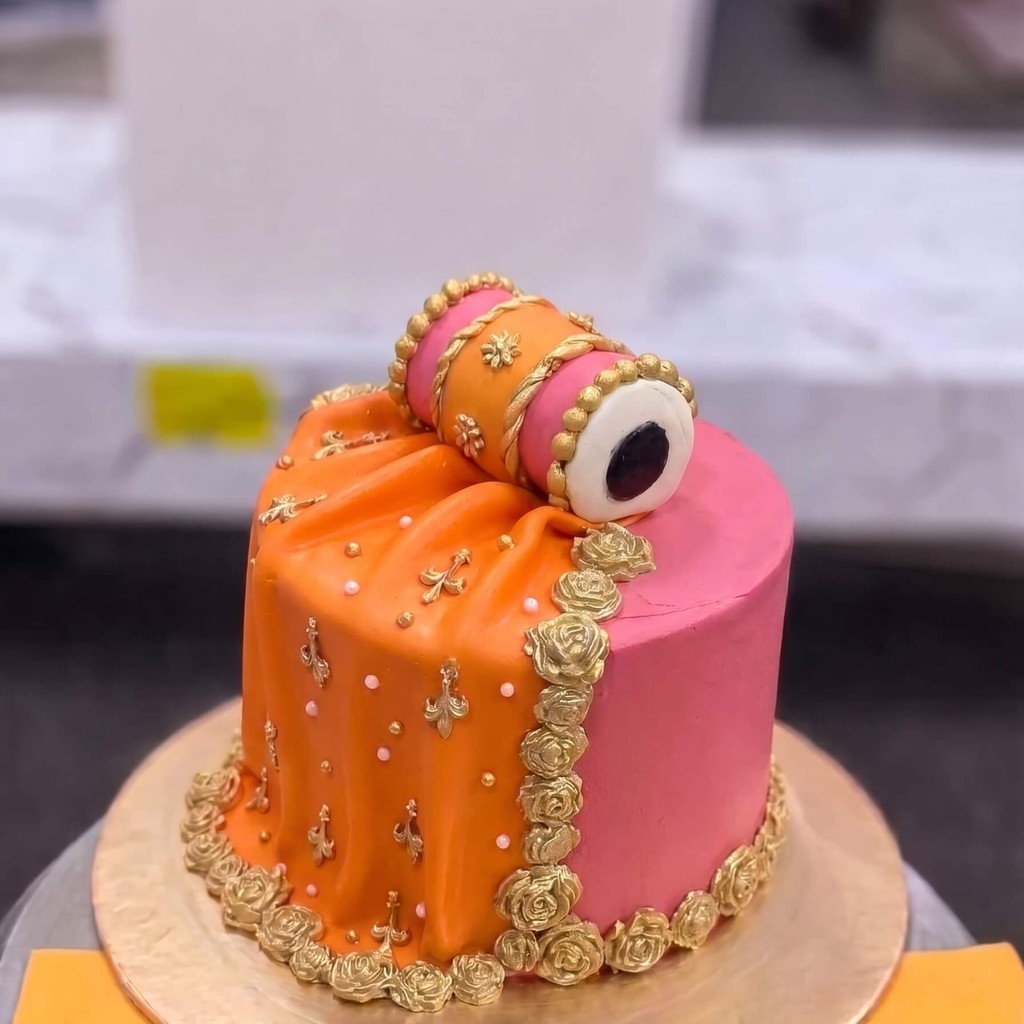 Special Nikah and Engagement Cakes in Lahore 2026 Guide 14 Orange & Pink Chooriyan Mehndi Cake in Lahore — Cococrave Lahore