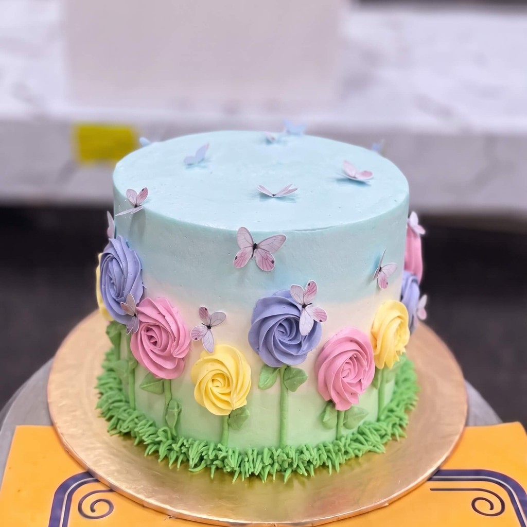 Pastel Butterfly Garden Cake in Lahore Pastel Butterfly Garden Cake by CocoCrave.pk in Lahore