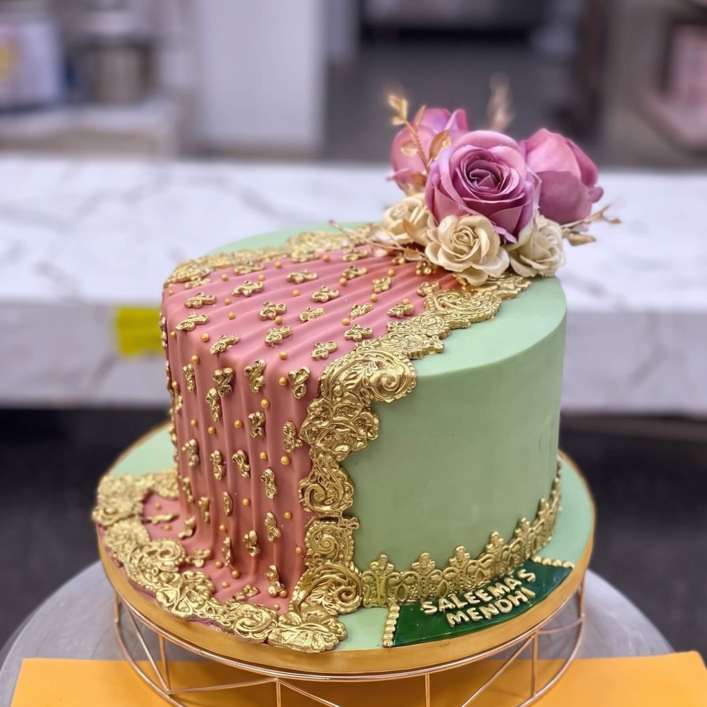 Magical Barbie Cakes in Lahore for Girls: 2026 Designer Guide 14 Pastel Green & Pink Floral Mehndi Cake in Lahore — Cococrave Lahore