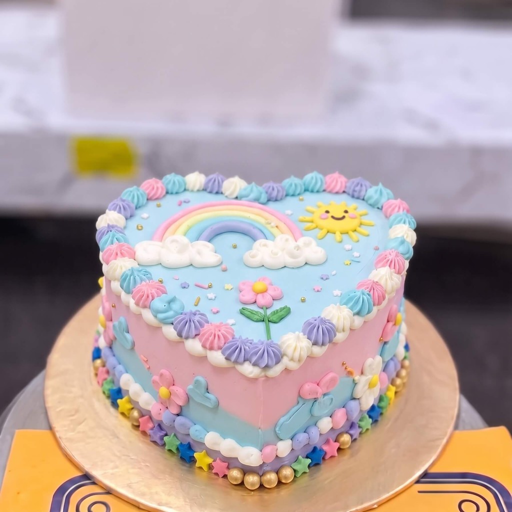 Pastel Heart Birthday Cake in Lahore — CocoCrave.pk Pastel Heart Birthday Cake in Lahore by CocoCrave.pk — single tier pastel heart cake in Blue