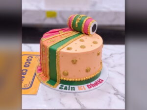 Peach & Green Dholki Mayoun Cake in Lahore